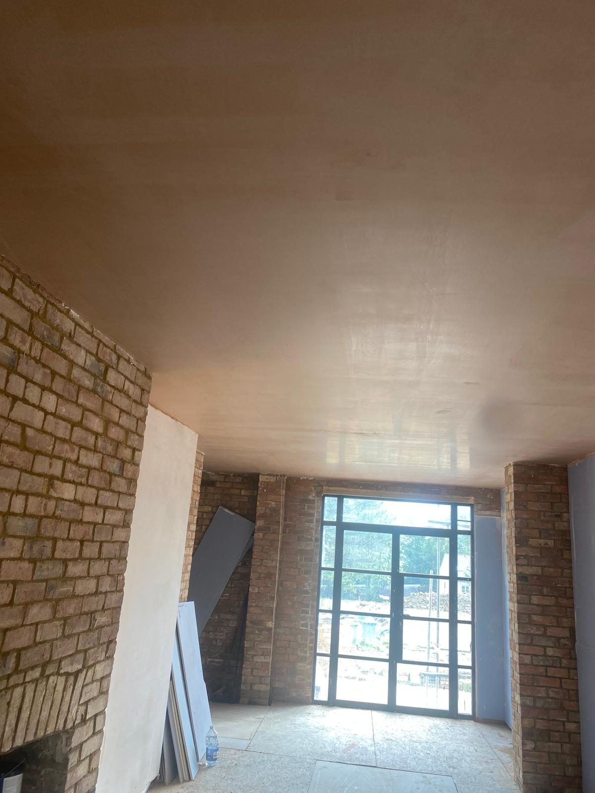 Large open-plan room skimmed to a flawless finish
